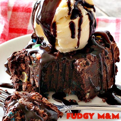 Fudgy M&M Brownies | Can't Stay Out of the Kitchen | these fantastic #brownies are rich, decadent & divine! They're filled with #M&Ms & glazed with #chocolate icing. Amazing #dessert.