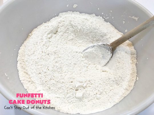 Funfetti Cake Donuts | Can't Stay Out of the Kitchen | my favorite #donut #recipe. These have delightful #almond flavoring in the donut & icing. #Sprinkles make everything better! Great for a #holiday #breakfast like #MemorialDay or #FathersDay. #Funfetti #FunfettiCakeDonuts #HolidayBreakfast