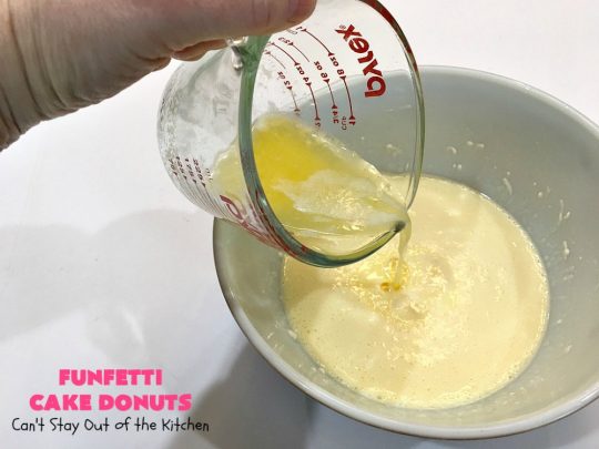 Funfetti Cake Donuts | Can't Stay Out of the Kitchen | my favorite #donut #recipe. These have delightful #almond flavoring in the donut & icing. #Sprinkles make everything better! Great for a #holiday #breakfast like #MemorialDay or #FathersDay. #Funfetti #FunfettiCakeDonuts #HolidayBreakfast