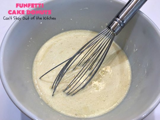Funfetti Cake Donuts | Can't Stay Out of the Kitchen | my favorite #donut #recipe. These have delightful #almond flavoring in the donut & icing. #Sprinkles make everything better! Great for a #holiday #breakfast like #MemorialDay or #FathersDay. #Funfetti #FunfettiCakeDonuts #HolidayBreakfast