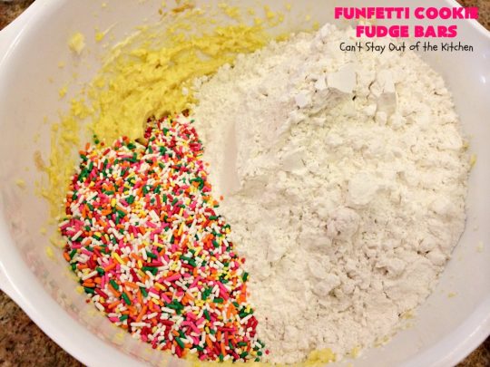 Funfetti Cookie Fudge Bars | Can't Stay Out of the Kitchen | these delicious #funfetti #cookies have a scrumptious #fudge frosting on top. Terrific for #tailgating parties, potlucks, backyard BBQs & summer #holiday fun like #FourthOfJuly. #chocolate #FunfettiCookie #FunfettiCookieFudgeBars #ChocolateDessert #FunfettiDessert