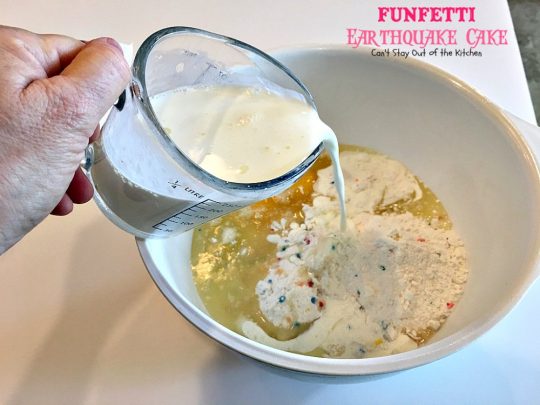 Funfetti Earthquake Cake | Can't Stay Out of the Kitchen | this is the perfect #cake for #birthdays or special occasions. #Creamcheese icing bakes into the cake causing volcano-like craters & an earthquake! #dessert #funfetti