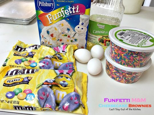 Funfetti M&M Cheesecake Brownies | Can't Stay Out of the Kitchen | these rich and decadent #brownies are sure to satisfy any sweet tooth craving. #peanutbutter #M&M's #rainbowsprinkles and #cheesecake make for an unbeatable combination. #dessert #chocolate