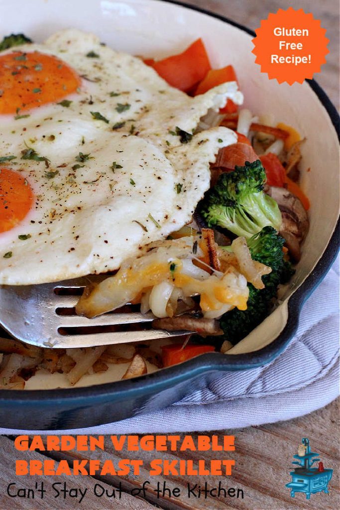 Garden Vegetable Breakfast Skillet | Can't Stay Out of the Kitchen | this delectable #BreakfastSkillet includes seasoned #HashBrowns, #MontereyJack & #CheddarCheese, several garden #vegetables including #mushrooms & #broccoli & it's topped with two #eggs. It's a fantastic hearty #breakfast for weekends, company or #holidays. #vegetarian #GlutenFree #VegetarianBreakfastSkillet #GardenVegetableBreakfastSkillet #HolidayBreakfast