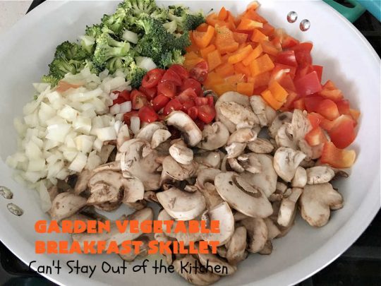 Garden Vegetable Breakfast Skillet | Can't Stay Out of the Kitchen | this delectable #BreakfastSkillet includes seasoned #HashBrowns, #MontereyJack & #CheddarCheese, several garden #vegetables including #mushrooms & #broccoli & it's topped with two #eggs. It's a fantastic hearty #breakfast for weekends, company or #holidays. #vegetarian #GlutenFree #VegetarianBreakfastSkillet #GardenVegetableBreakfastSkillet #HolidayBreakfast