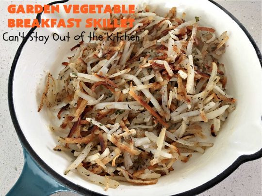 Garden Vegetable Breakfast Skillet | Can't Stay Out of the Kitchen | this delectable #BreakfastSkillet includes seasoned #HashBrowns, #MontereyJack & #CheddarCheese, several garden #vegetables including #mushrooms & #broccoli & it's topped with two #eggs. It's a fantastic hearty #breakfast for weekends, company or #holidays. #vegetarian #GlutenFree #VegetarianBreakfastSkillet #GardenVegetableBreakfastSkillet #HolidayBreakfast