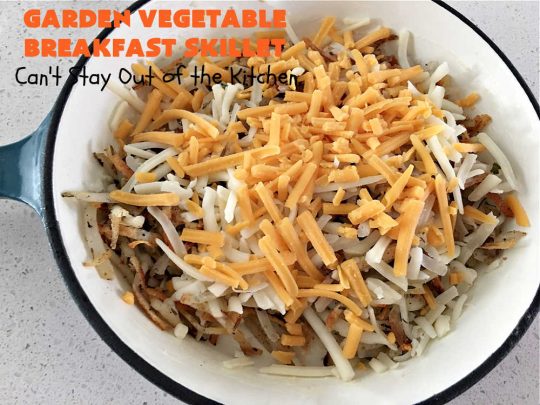 Garden Vegetable Breakfast Skillet | Can't Stay Out of the Kitchen | this delectable #BreakfastSkillet includes seasoned #HashBrowns, #MontereyJack & #CheddarCheese, several garden #vegetables including #mushrooms & #broccoli & it's topped with two #eggs. It's a fantastic hearty #breakfast for weekends, company or #holidays. #vegetarian #GlutenFree #VegetarianBreakfastSkillet #GardenVegetableBreakfastSkillet #HolidayBreakfast