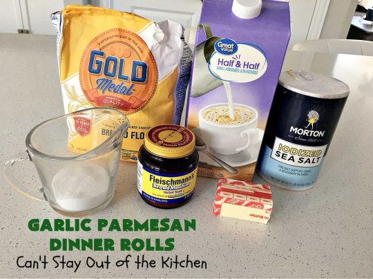 Garlic Parmesan Dinner Rolls | Can't Stay Out of the Kitchen | these #DinnerRolls are fantastic! They're easy to whip up since they're no-knead #rolls. #NoKneading #NoMixing! They're made in the #breadmaker. The rolls are glazed with a #garlic #parmesan #herb butter sauce and are totally mouthwatering. Great for #holidays, company dinners & especially any time you serve #pasta. Everyone will want seconds! #bread #GarlicParmesanDinnerRolls