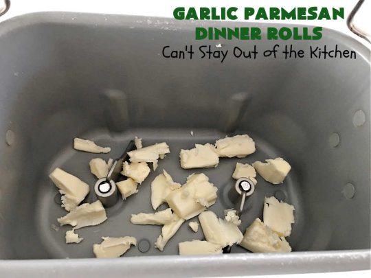 Garlic Parmesan Dinner Rolls | Can't Stay Out of the Kitchen | these #DinnerRolls are fantastic! They're easy to whip up since they're no-knead #rolls. #NoKneading #NoMixing! They're made in the #breadmaker. The rolls are glazed with a #garlic #parmesan #herb butter sauce and are totally mouthwatering. Great for #holidays, company dinners & especially any time you serve #pasta. Everyone will want seconds! #bread #GarlicParmesanDinnerRolls