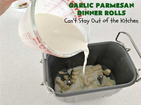 Garlic Parmesan Dinner Rolls | Can't Stay Out of the Kitchen | these #DinnerRolls are fantastic! They're easy to whip up since they're no-knead #rolls. #NoKneading #NoMixing! They're made in the #breadmaker. The rolls are glazed with a #garlic #parmesan #herb butter sauce and are totally mouthwatering. Great for #holidays, company dinners & especially any time you serve #pasta. Everyone will want seconds! #bread #GarlicParmesanDinnerRolls