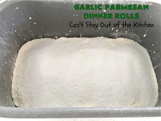 Garlic Parmesan Dinner Rolls | Can't Stay Out of the Kitchen | these #DinnerRolls are fantastic! They're easy to whip up since they're no-knead #rolls. #NoKneading #NoMixing! They're made in the #breadmaker. The rolls are glazed with a #garlic #parmesan #herb butter sauce and are totally mouthwatering. Great for #holidays, company dinners & especially any time you serve #pasta. Everyone will want seconds! #bread #GarlicParmesanDinnerRolls