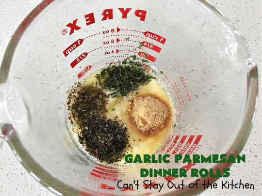 Garlic Parmesan Dinner Rolls | Can't Stay Out of the Kitchen | these #DinnerRolls are fantastic! They're easy to whip up since they're no-knead #rolls. #NoKneading #NoMixing! They're made in the #breadmaker. The rolls are glazed with a #garlic #parmesan #herb butter sauce and are totally mouthwatering. Great for #holidays, company dinners & especially any time you serve #pasta. Everyone will want seconds! #bread #GarlicParmesanDinnerRolls