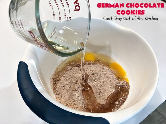 German Chocolate Cookies | Can't Stay Out of the Kitchen | these luscious #cookies use only 6 ingredients since they start with a #CakeMix. If you enjoy #GermanChocolateCake this #dessert is for you! #coconut #pecans #chocolate #GermanChocolateCookies #ChocolateChips #tailgating #holiday #ChristmasCookieExchange #HolidayBaking