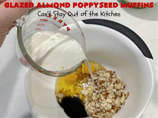 Glazed Almond Poppyseed Muffins | Can't Stay Out of the Kitchen | these fantastic #muffins just pop with #almond flavor. They're delightful to serve for a family, company or #holiday #breakfast. Every bite will have you swooning. #poppyseeds #GlazedAlmondPoppyseedMuffins