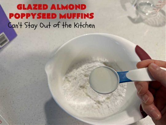 Glazed Almond Poppyseed Muffins | Can't Stay Out of the Kitchen | these fantastic #muffins just pop with #almond flavor. They're delightful to serve for a family, company or #holiday #breakfast. Every bite will have you swooning. #poppyseeds #GlazedAlmondPoppyseedMuffins