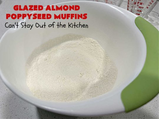 Glazed Almond Poppyseed Muffins | Can't Stay Out of the Kitchen | these fantastic #muffins just pop with #almond flavor. They're delightful to serve for a family, company or #holiday #breakfast. Every bite will have you swooning. #poppyseeds #GlazedAlmondPoppyseedMuffins