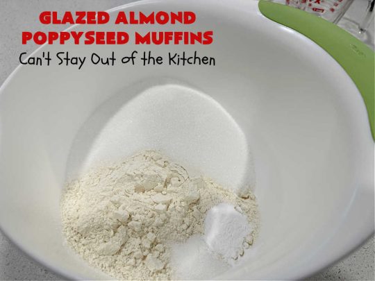 Glazed Almond Poppyseed Muffins | Can't Stay Out of the Kitchen | these fantastic #muffins just pop with #almond flavor. They're delightful to serve for a family, company or #holiday #breakfast. Every bite will have you swooning. #poppyseeds #GlazedAlmondPoppyseedMuffins