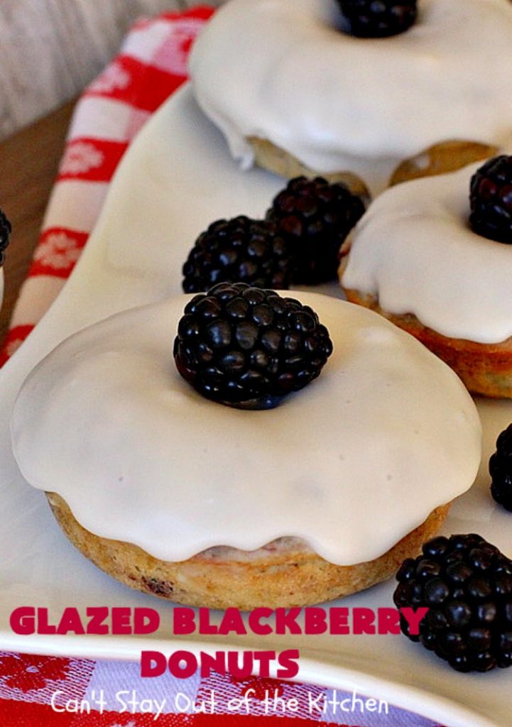 Glazed Blackberry Donuts | Can't Stay Out of the Kitchen | these #donuts are absolutely heavenly. They're filled with #blackberries & glazed with a luscious vanilla glaze. Perfect for a #holiday, company or weekend #breakfast. #HolidayBreakfast #BlackberryDonuts #BakedDonuts