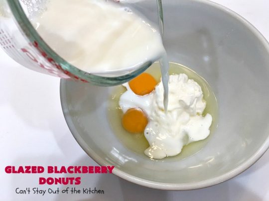 Glazed Blackberry Donuts | Can't Stay Out of the Kitchen | these #donuts are absolutely heavenly. They're filled with #blackberries & glazed with a luscious vanilla glaze. Perfect for a #holiday, company or weekend #breakfast. #HolidayBreakfast #BlackberryDonuts #BakedDonuts