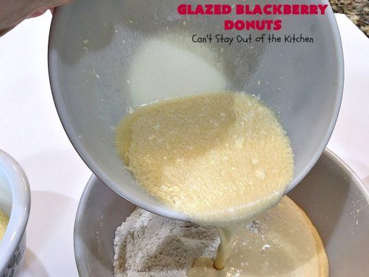 Glazed Blackberry Donuts | Can't Stay Out of the Kitchen | these #donuts are absolutely heavenly. They're filled with #blackberries & glazed with a luscious vanilla glaze. Perfect for a #holiday, company or weekend #breakfast. #HolidayBreakfast #BlackberryDonuts #BakedDonuts