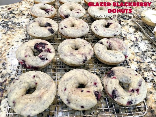 Glazed Blackberry Donuts | Can't Stay Out of the Kitchen | these #donuts are absolutely heavenly. They're filled with #blackberries & glazed with a luscious vanilla glaze. Perfect for a #holiday, company or weekend #breakfast. #HolidayBreakfast #BlackberryDonuts #BakedDonuts