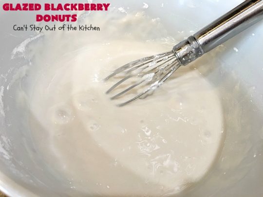 Glazed Blackberry Donuts | Can't Stay Out of the Kitchen | these #donuts are absolutely heavenly. They're filled with #blackberries & glazed with a luscious vanilla glaze. Perfect for a #holiday, company or weekend #breakfast. #HolidayBreakfast #BlackberryDonuts #BakedDonuts
