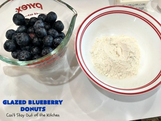 Glazed Blueberry Donuts | Can't Stay Out of the Kitchen | if you want to wow your family & friends, make these heavenly #blueberry #donuts for #breakfast. They're absolutely spectacular. #Holiday #HolidayBreakfast #CompanyBreakfast #BlueberryDonuts #GlazedBlueberryDonuts 