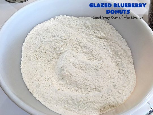 Glazed Blueberry Donuts | Can't Stay Out of the Kitchen | if you want to wow your family & friends, make these heavenly #blueberry #donuts for #breakfast. They're absolutely spectacular. #Holiday #HolidayBreakfast #CompanyBreakfast #BlueberryDonuts #GlazedBlueberryDonuts 