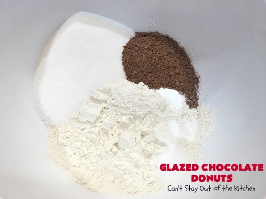 Glazed Chocolate Donuts | Can't Stay Out of the Kitchen | these mouthwatering #donuts are the ultimate in comfort food! They're glazed with a vanilla icing and so delicious you won't be able to stay out of them! #Chocolate #ChocolateDonuts #Breakfast #Holiday #HolidayBreakfast #Brunch #GlazedChocolateDonuts