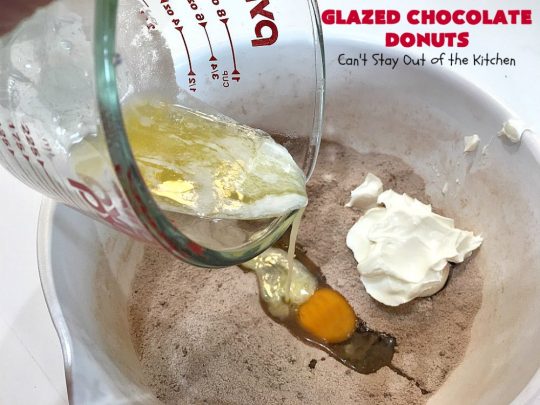 Glazed Chocolate Donuts | Can't Stay Out of the Kitchen | these mouthwatering #donuts are the ultimate in comfort food! They're glazed with a vanilla icing and so delicious you won't be able to stay out of them! #Chocolate #ChocolateDonuts #Breakfast #Holiday #HolidayBreakfast #Brunch #GlazedChocolateDonuts
