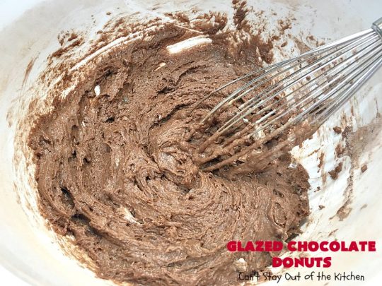 Glazed Chocolate Donuts | Can't Stay Out of the Kitchen | these mouthwatering #donuts are the ultimate in comfort food! They're glazed with a vanilla icing and so delicious you won't be able to stay out of them! #Chocolate #ChocolateDonuts #Breakfast #Holiday #HolidayBreakfast #Brunch #GlazedChocolateDonuts