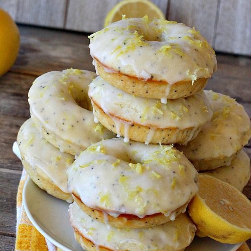 Glazed Lemon Poppyseed Donuts | Can't Stay Out of the Kitchen | these #donuts are awesome! They have #lemon juice & lemon zest in both the donut and icing. Terrific for a weekend or #holiday #breakfast. #poppyseeds #HolidayBreakfast #LemonPoppyseedDonuts #HomemadeDonuts