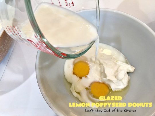 Glazed Lemon Poppyseed Donuts | Can't Stay Out of the Kitchen | these #donuts are awesome! They have #lemon juice & lemon zest in both the donut and icing. Terrific for a weekend or #holiday #breakfast. #poppyseeds #HolidayBreakfast #LemonPoppyseedDonuts #HomemadeDonuts