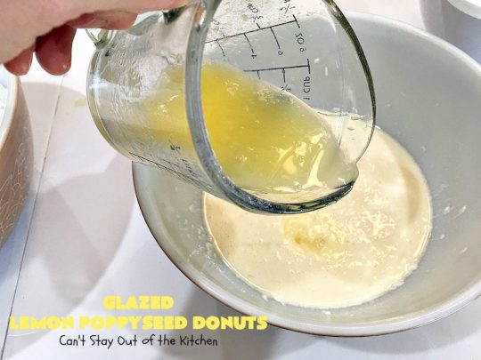 Glazed Lemon Poppyseed Donuts | Can't Stay Out of the Kitchen | these #donuts are awesome! They have #lemon juice & lemon zest in both the donut and icing. Terrific for a weekend or #holiday #breakfast. #poppyseeds #HolidayBreakfast #LemonPoppyseedDonuts #HomemadeDonuts