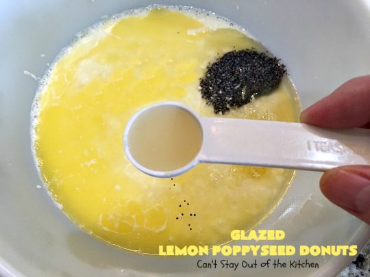 Glazed Lemon Poppyseed Donuts | Can't Stay Out of the Kitchen | these #donuts are awesome! They have #lemon juice & lemon zest in both the donut and icing. Terrific for a weekend or #holiday #breakfast. #poppyseeds #HolidayBreakfast #LemonPoppyseedDonuts #HomemadeDonuts