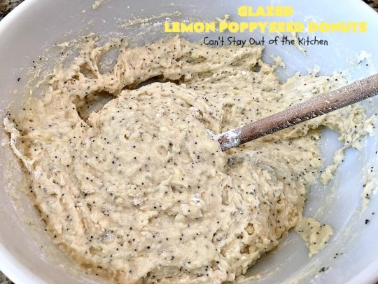 Glazed Lemon Poppyseed Donuts | Can't Stay Out of the Kitchen | these #donuts are awesome! They have #lemon juice & lemon zest in both the donut and icing. Terrific for a weekend or #holiday #breakfast. #poppyseeds #HolidayBreakfast #LemonPoppyseedDonuts #HomemadeDonuts