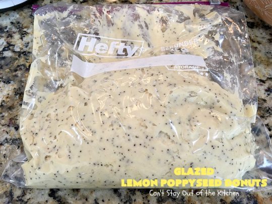 Glazed Lemon Poppyseed Donuts | Can't Stay Out of the Kitchen | these #donuts are awesome! They have #lemon juice & lemon zest in both the donut and icing. Terrific for a weekend or #holiday #breakfast. #poppyseeds #HolidayBreakfast #LemonPoppyseedDonuts #HomemadeDonuts