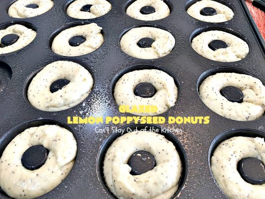 Glazed Lemon Poppyseed Donuts | Can't Stay Out of the Kitchen | these #donuts are awesome! They have #lemon juice & lemon zest in both the donut and icing. Terrific for a weekend or #holiday #breakfast. #poppyseeds #HolidayBreakfast #LemonPoppyseedDonuts #HomemadeDonuts