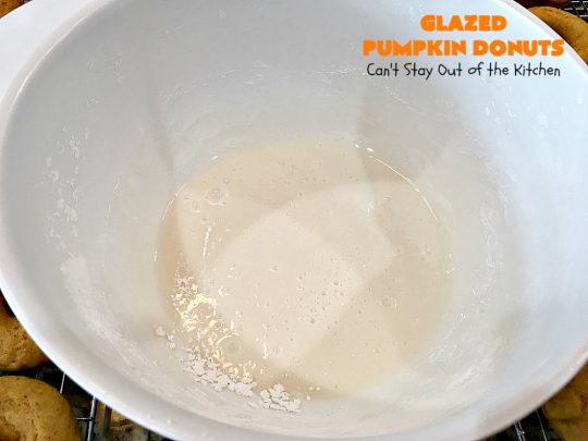Glazed Pumpkin Donuts | Can't Stay Out of the Kitchen | These #donuts will knock your socks off! They're filled with #pumpkin & pumpkin pie spice. Then they're glazed with vanilla icing & sprinkled with #cinnamon. Terrific for #fall & winter #baking, #holidays & company. #PumpkinDonuts #Breakfast #HolidayBreakfast #NewYearsDay #NewYearsDayBreakfast