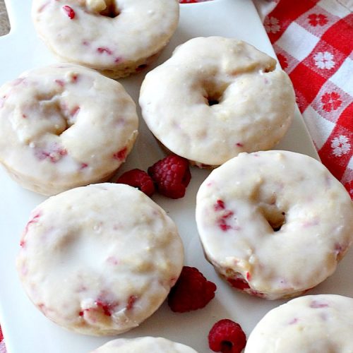 Glazed Raspberry Donuts | Can't Stay Out of the Kitchen | these heavenly #donuts are filled with fresh #Raspberries & both #vanilla & #almond extracts. The icing also includes both extracts. They will have you salivating from the first bite. Terrific for #ValentinesDayBreakfast. #Breakfast #Holiday #Raspberry #HolidayBreakfast #RaspberryDonuts #brunch #Christmas #HolidayBrunch #ChristmasBreakfast #FourthofJulyBreakfast