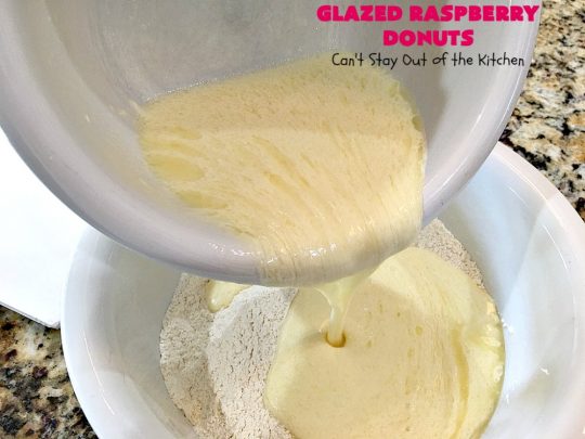 Glazed Raspberry Donuts | Can't Stay Out of the Kitchen | these heavenly #donuts are filled with fresh #Raspberries & both #vanilla & #almond extracts. The icing also includes both extracts. They will have you salivating from the first bite. Terrific for #ValentinesDayBreakfast. #Breakfast #Holiday #Raspberry #HolidayBreakfast #RaspberryDonuts #brunch #Christmas #HolidayBrunch #ChristmasBreakfast #FourthofJulyBreakfast
