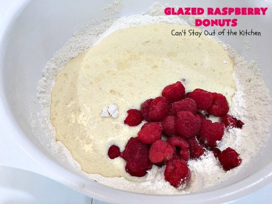 Glazed Raspberry Donuts | Can't Stay Out of the Kitchen | these heavenly #donuts are filled with fresh #Raspberries & both #vanilla & #almond extracts. The icing also includes both extracts. They will have you salivating from the first bite. Terrific for #ValentinesDayBreakfast. #Breakfast #Holiday #Raspberry #HolidayBreakfast #RaspberryDonuts #brunch #Christmas #HolidayBrunch #ChristmasBreakfast #FourthofJulyBreakfast