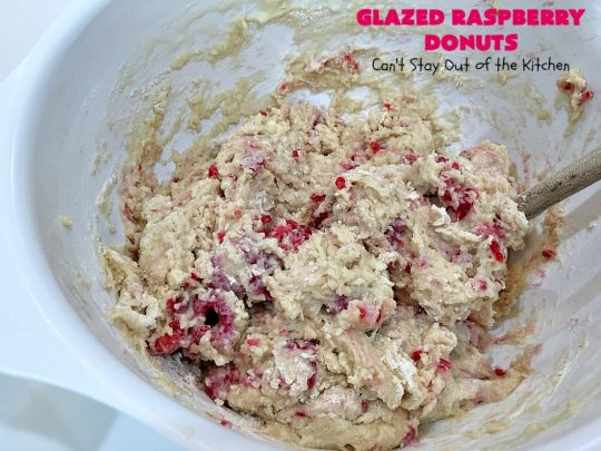 Glazed Raspberry Donuts | Can't Stay Out of the Kitchen | these heavenly #donuts are filled with fresh #Raspberries & both #vanilla & #almond extracts. The icing also includes both extracts. They will have you salivating from the first bite. Terrific for #ValentinesDayBreakfast. #Breakfast #Holiday #Raspberry #HolidayBreakfast #RaspberryDonuts #brunch #Christmas #HolidayBrunch #ChristmasBreakfast #FourthofJulyBreakfast