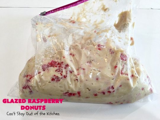 Glazed Raspberry Donuts | Can't Stay Out of the Kitchen | these heavenly #donuts are filled with fresh #Raspberries & both #vanilla & #almond extracts. The icing also includes both extracts. They will have you salivating from the first bite. Terrific for #ValentinesDayBreakfast. #Breakfast #Holiday #Raspberry #HolidayBreakfast #RaspberryDonuts #brunch #Christmas #HolidayBrunch #ChristmasBreakfast #FourthofJulyBreakfast