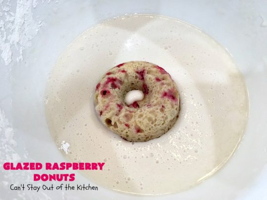 Glazed Raspberry Donuts | Can't Stay Out of the Kitchen | these heavenly #donuts are filled with fresh #Raspberries & both #vanilla & #almond extracts. The icing also includes both extracts. They will have you salivating from the first bite. Terrific for #ValentinesDayBreakfast. #Breakfast #Holiday #Raspberry #HolidayBreakfast #RaspberryDonuts #brunch #Christmas #HolidayBrunch #ChristmasBreakfast #FourthofJulyBreakfast