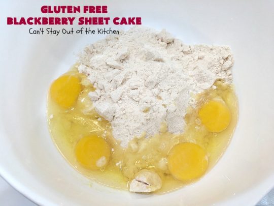 Gluten Free Blackberry Sheet Cake | Can't Stay Out of the Kitchen | your family will never believe this spectacular #cake is #GlutenFree! It's made with #BlackberryPieFilling & has a #CreamCheese icing to die for. Great for the #holidays. #dessert #SheetCake #HolidayDessert #GlutenFreeBlackberrySheetCake