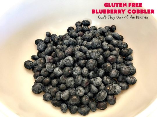 Gluten Free Blueberry Cobbler | Can't Stay Out of the Kitchen | this fantastic #cobbler is perfect for #holiday menus like #MothersDay or #FathersDay. It's filled with fresh #blueberries & has a delightful #glutenfree topping. Then it's served with warm blueberry sauce & ice cream! You'll never believe this decadent #dessert doesn't have regular flour! #BlueberryCobbler 