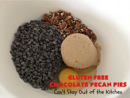 Gluten Free Chocolate Pecan Pies | Can't Stay Out of the Kitchen | these miniature #PecanPies are outstanding! They include miniature #chocolate chips to increase flavor & deliciousness. These fabulous #cookies can be made with #GlutenFree flour or regular flour--depending on your needs. Every bite will rock your world. Enjoy at #tailgating parties, potlucks or even #holiday #baking. #Christmas #PecanDessert #ChocolateDessert #GlutenFreeChocolatePecanPies