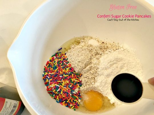 Gluten Free Confetti Sugar Cookie Pancakes | Can't Stay Out of the Kitchen | these awesome #pancakes taste like #sugarcookies with a lot of #sprinkles but in pancake form! Amazing #holiday #breakfast recipe too. #glutenfree
