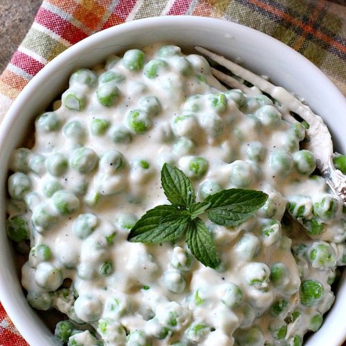 Gluten Free Creamed Peas | Can't Stay Out of the Kitchen | this delicious #sidedish takes less than 10 minutes to prepare. That makes it perfect for #holiday or company meals when you're short on time. The flavors are amped up with a little #Creole seasoning. So delicious. #Cajun #peas #glutenfree #creamedpeas